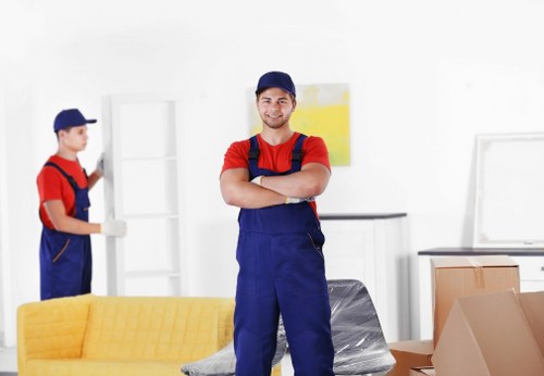 A moving team preparing boxes and furniture for Earlscourt removals