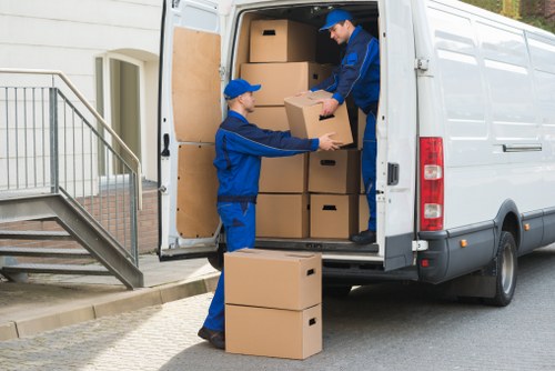 Local commercial move team handling furniture and boxes in Earlscourt