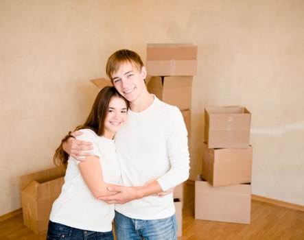 Staff handling furniture safely with proper lifting technique