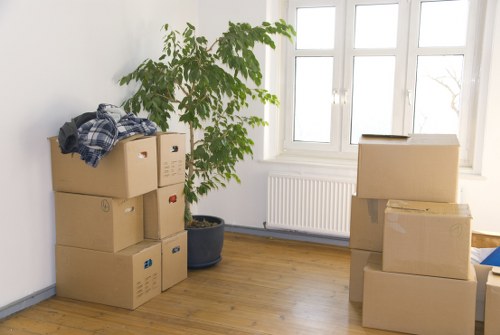 Packing and loading belongings into a removals van