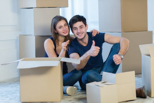 Movers assessing items and access points before beginning a removal job