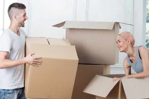 Packed boxes and furniture ready for moving day in Earlscourt