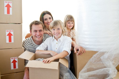 Furniture being carried through a London property during Earlscourt removals