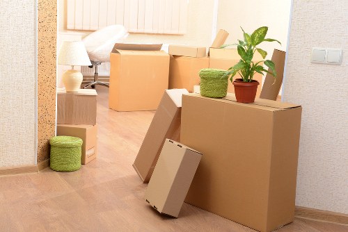 Commercial items and boxes prepared for a local moving van service