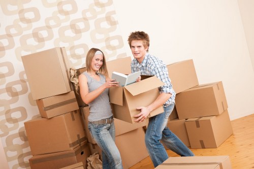 Trained removal staff using protective equipment during a carefully planned move